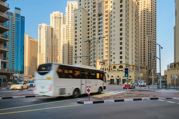 A coach on the move through Dubai Marina